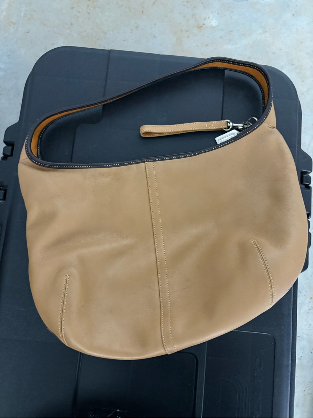 Coach Tan Leather Hobo style purse in Tan leather Brown interior.